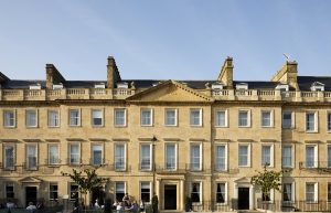 Exterior of Hotel Indigo Bath, honey-coloured Georgian architecture